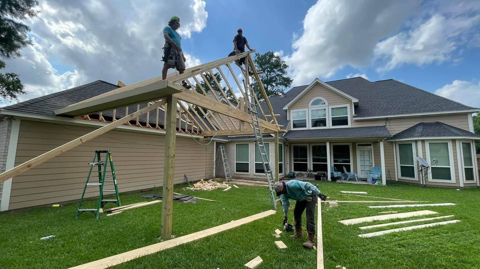 GTH crew framing a covered patio addition in Northwest Houston